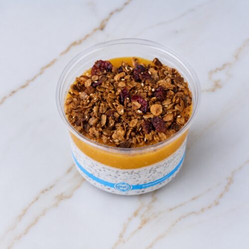 Chia pudding with mango puree and homemade granula Product img Chia pudding with mango puree and homemade granula
