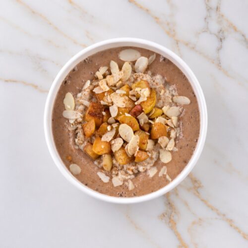 Oat with banana puree and caramelized peach
