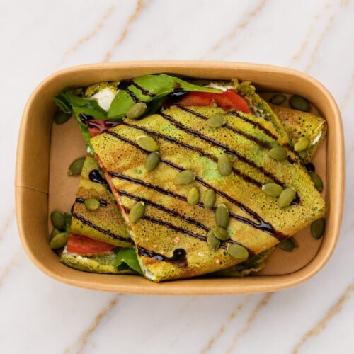 Spinach omlet with cream cheese and tomatoes,salad leaves inside