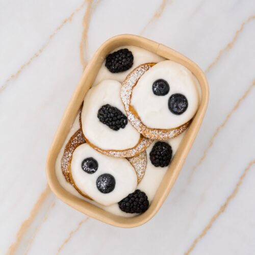 Vanilla -blueberry pancacke with vanilla cream on the top